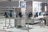 Complete Project High Speed Automatic Chemical Product Linear Type Servo Lube Engine Oil Filling Capping Machine