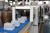 Automatic High Speed Daily Use Beverage Plastic Glass Pp Pc Bottle Heat Shrink Film Packing Wrapping Machine