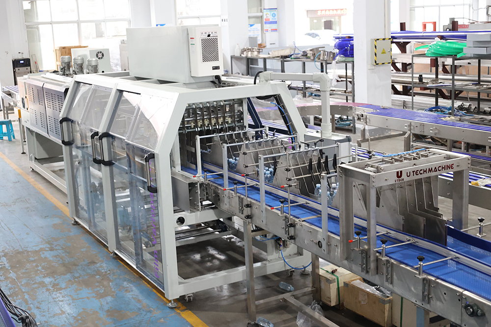 China Automatic Beverage Plastic Hdpe Bottle Heat Film Shrink Wrap Flow Packing Machine for Sale