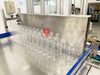 Automatic HDPE PVC PP PET Empty Bottle Jerry Can Barrel Bagging Packing Machine