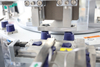 High Speed Rotary Three Parts Make-up Water And Lotion Cosmetics Bottle Plastic Cap Assembly Machine
