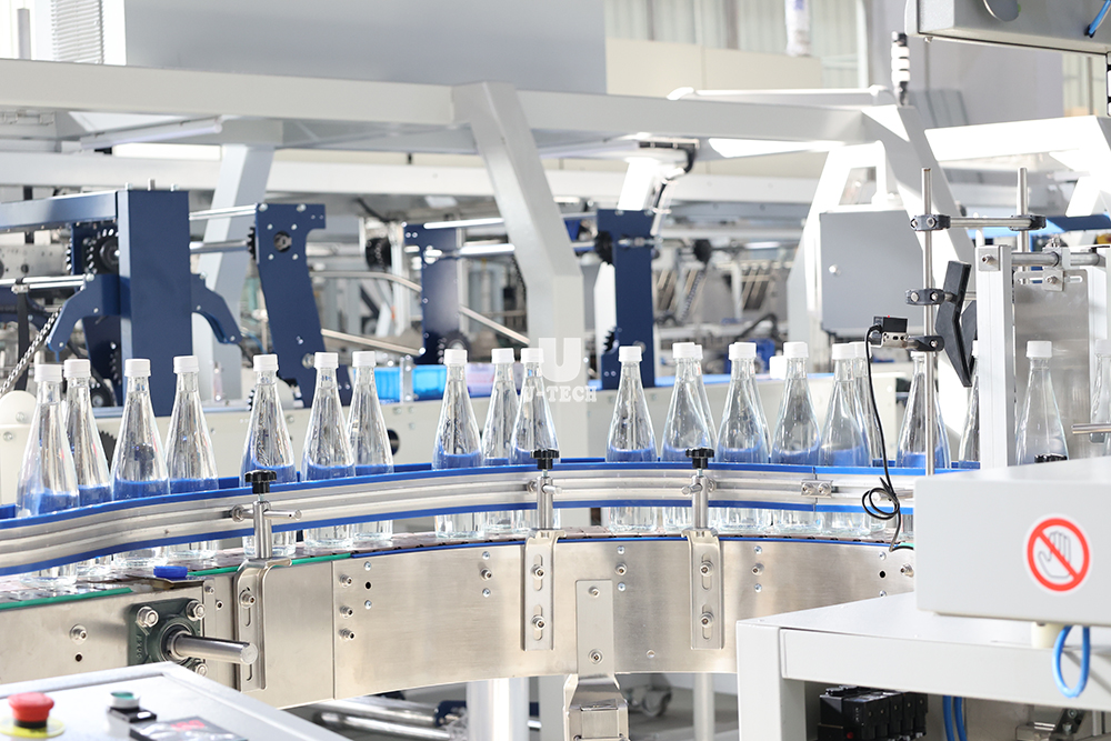 Industrial Automatic High Speed Beverage PET Bottle Wrap Machine Plastic Sleeve Shrink Tunnel Film Packing Competitive Price
