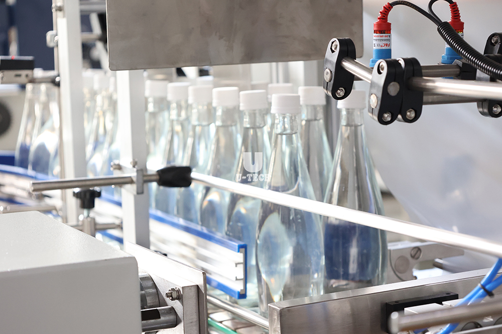 Automatic Daily Use Product Beverage HDPE Glass Plastic Bottle Shrink Wrap Packing Machine